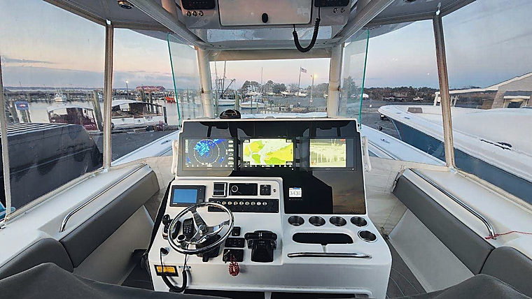 Electronics & Custom Dash Panels: a job by Evolution Marine Electronics
